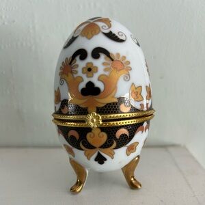 Porcelain Footed Decorative Egg with Gold Accents. Trinket holder. Opens. Fun!